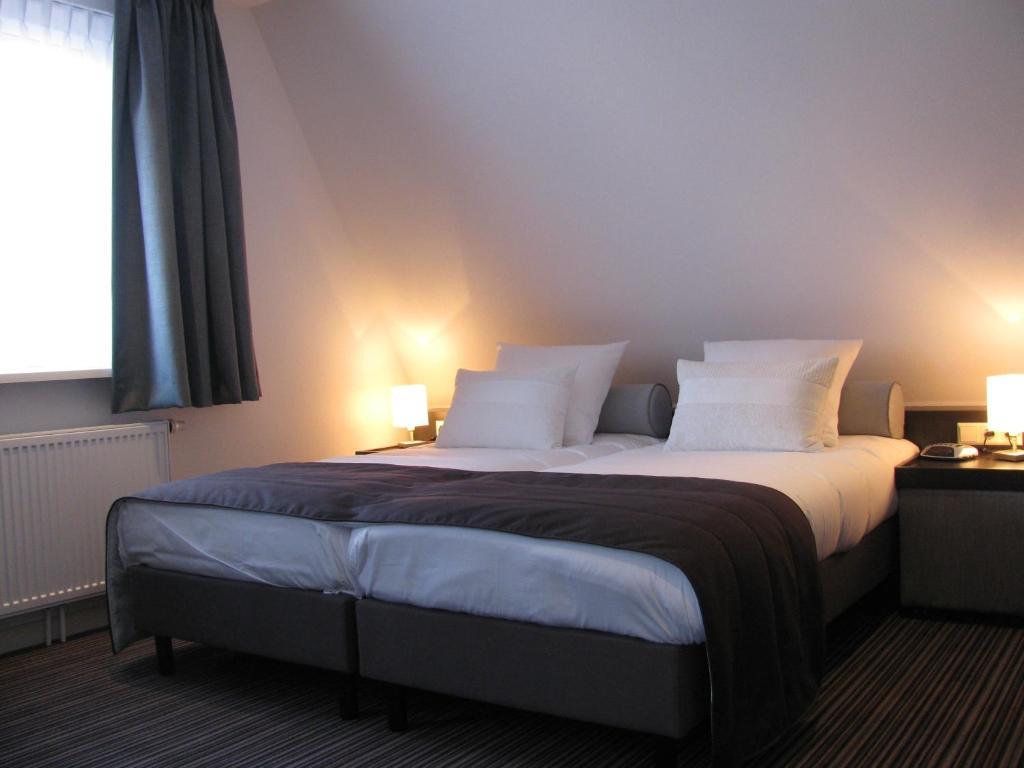 Boutique Hotel De Zwaluw De Koog  Phòng bức ảnh