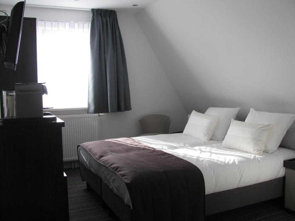 Boutique Hotel De Zwaluw De Koog  Phòng bức ảnh